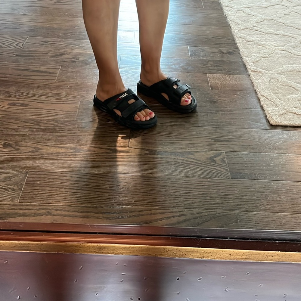 Brand new, never worn. Speedo water shoes size small. Adjustable straps!